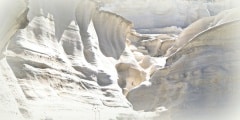 Caves and rock formations by the sea at Sarakiniko area on Milos island,a Greece