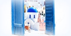 Open traditional Greek blue window on Santorini island, Greece