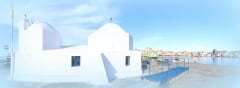 White chapel in the harbor of Aegina.Greece.