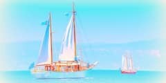 2 Old classic wooden sailing boats in Spetses island in Greece