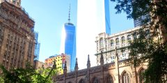 Trinty Church in New York City with skyscrapers on the backgroun