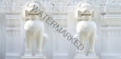 two white lion statue in thailand temple.