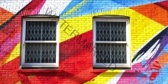 Brightly multi-coloured painted wall