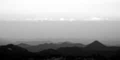 Landscape with huge mountain range. Black and white