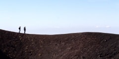 People walking along Etna volcano, Cicily