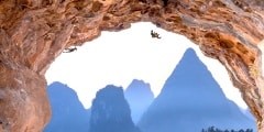 Deep high Cave extreme Climbers on Sunrise in China Mountains